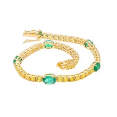 Bracciale di smeraldi naturali con smeraldo da 2,60 carati e zaffiro giallo da 6,00 carati 18k
