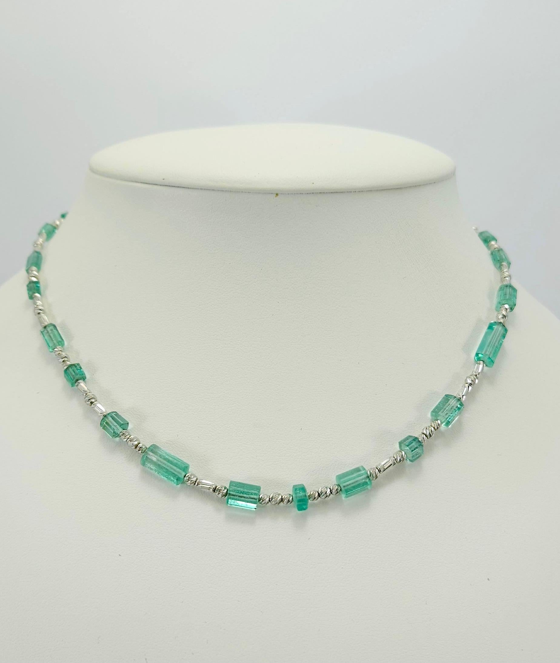 This natural Emerald Crystal Necklace with 18 Carat White Gold is handcut in German quality.
18kt hexagonl white gold clasp matchs perfectly to the natural crystal shape of the Emerald (green beryl).
The screw clasp is easy to handle and very