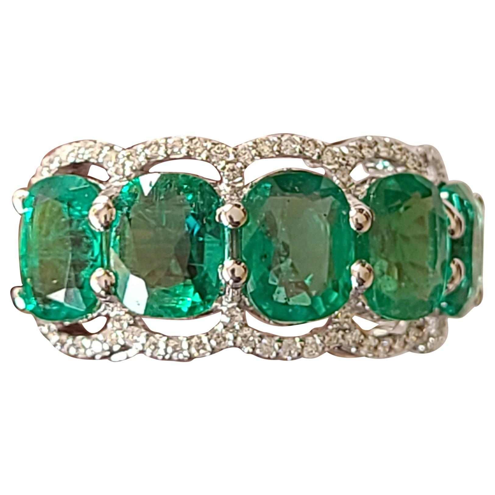 Natural Emerald Cushion Ring Set in 18 Karat Gold with Diamonds