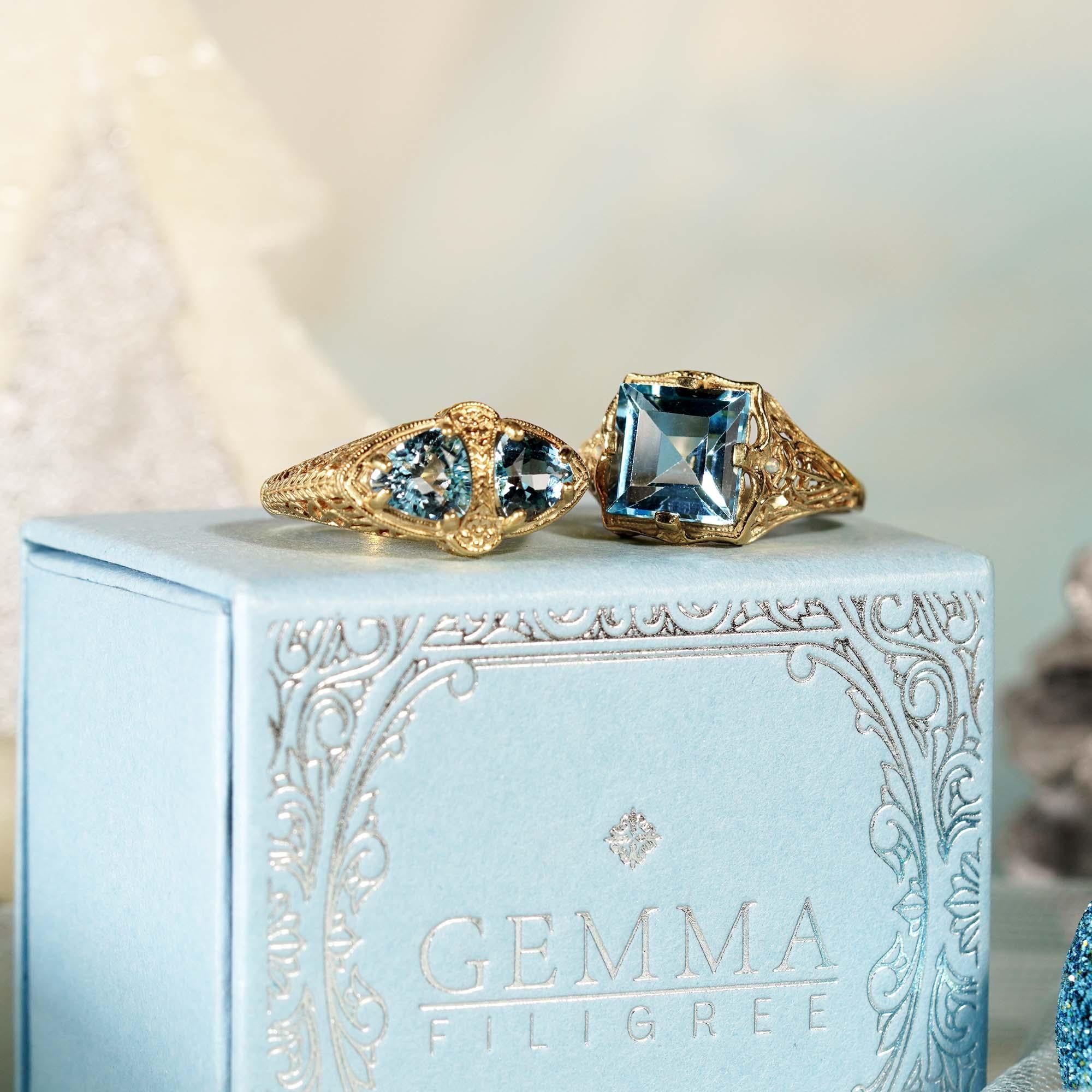 For Sale:  Natural Emerald Cut Blue Topaz Vintage Style Filigree Ring in Solid 9K Gold  12