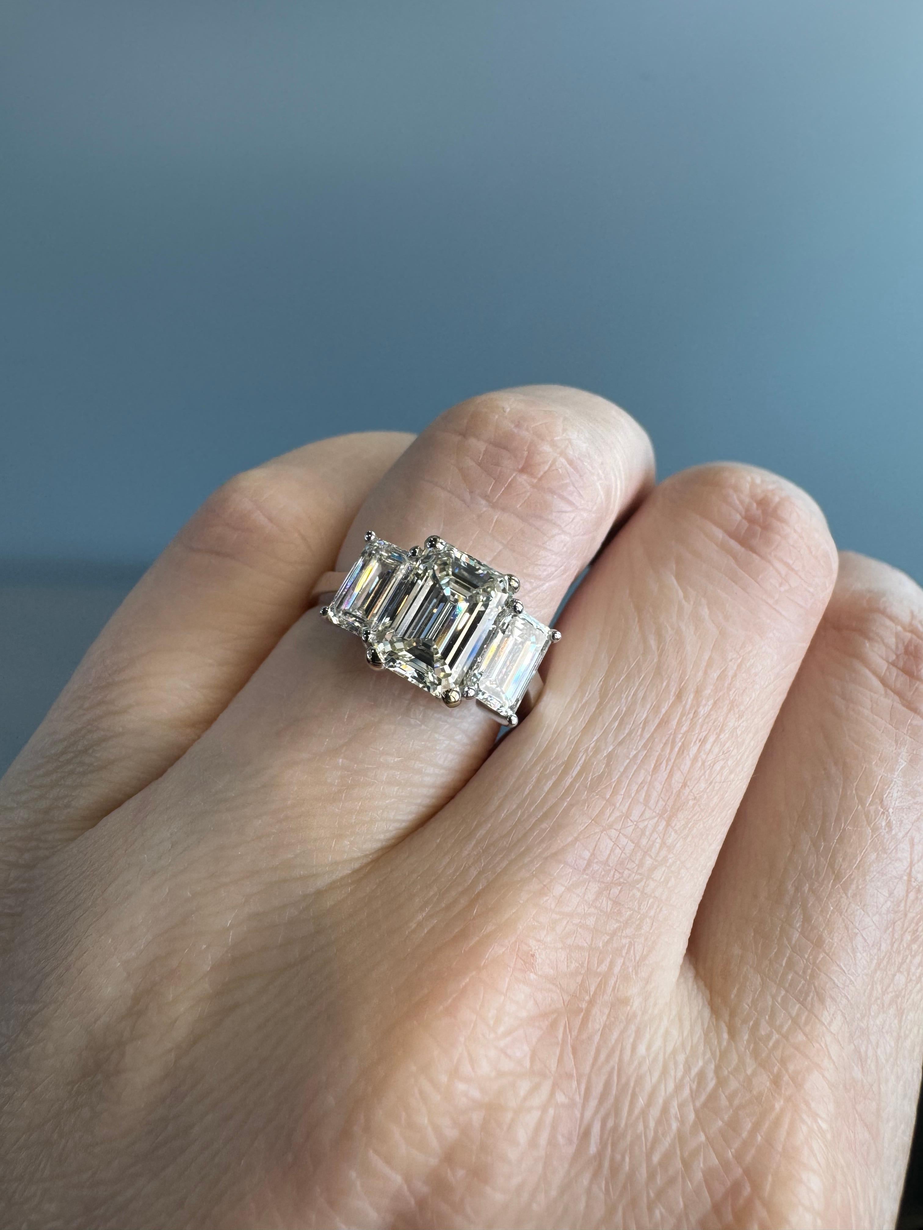 Women's Natural Emerald Cut Diamond 3 Stone 18 Karat Engagement Ring In Stock For Sale