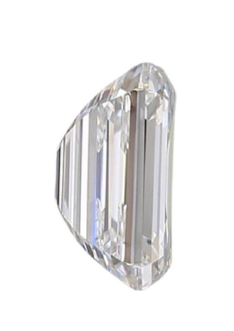 Women's or Men's Natural Emerald Cut diamond in a 0.71 Carat D VS1, IGI Cert For Sale