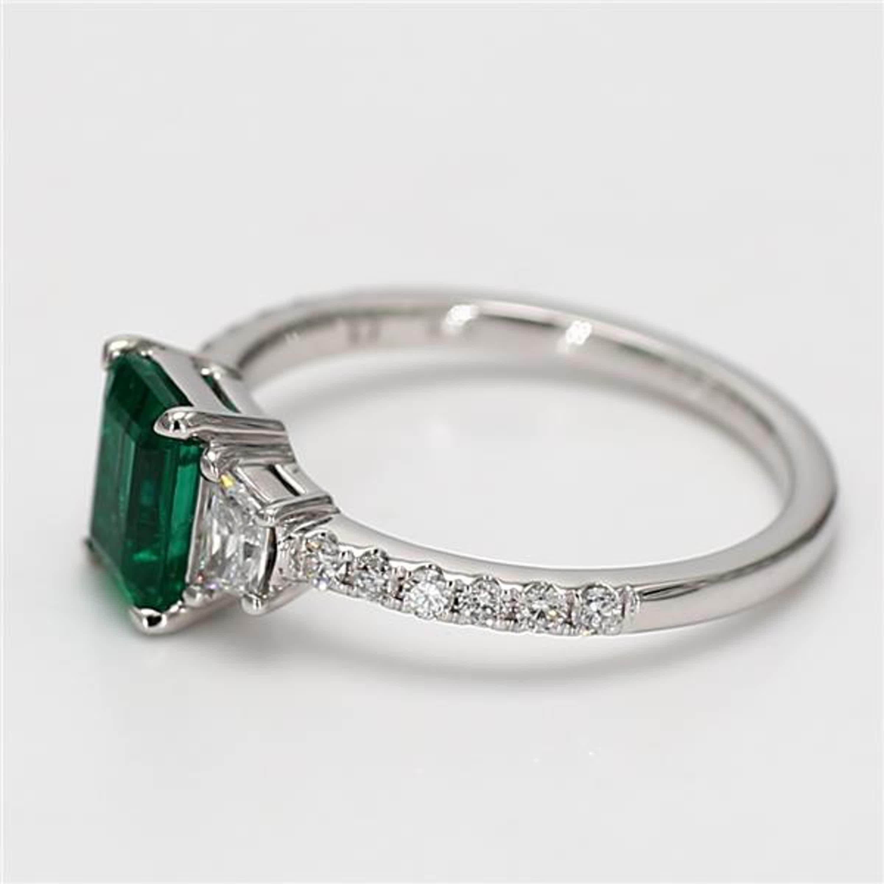 Contemporary Natural Emerald Cut Emerald and White Diamond 1.45 Carat TW Gold Cocktail Ring For Sale