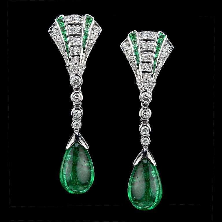 Pear Shape Natural Emerald from Zambia, Intense Green color all over the pieces, both weight 7.50 Carat with French Cut Emerald 20 pieces 0.55 Carat and 42 pieces round cut Diamonds 0.53 Carat Drop Earrings on 18k White Gold Setting.

