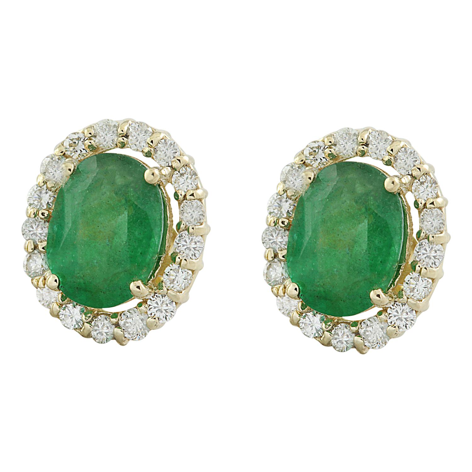 Introducing a mesmerizing pair of earrings that exude elegance and sophistication - the 4.70 Carat Natural Emerald 14 Karat Solid Yellow Gold Diamond Earrings. These earrings are a symbol of opulence and refinement.

Crafted to perfection, these