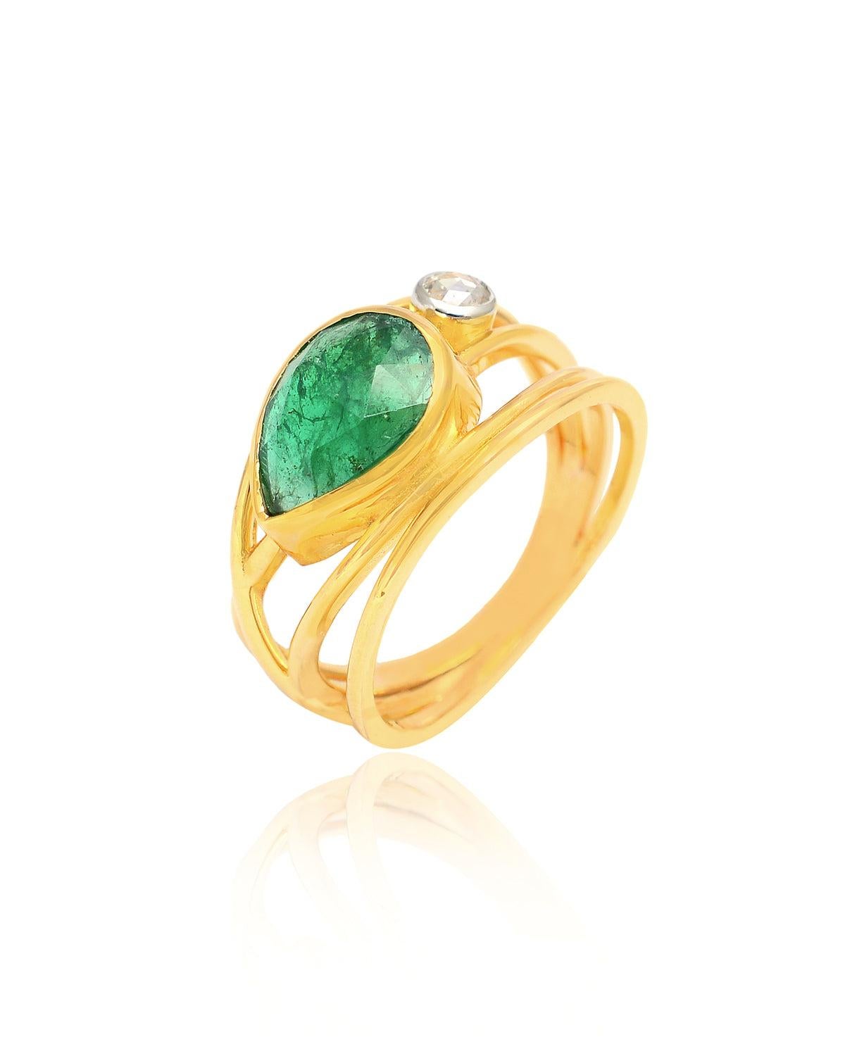 Dream on with our Khwaab ring made with 14K Solid Yellow Gold, 0.13 Carat Natural Diamond (G-H Color, SI1-SI2 Purity) and 1.89 Carat Emerald! The spiral design is a rarity to find with the rich finesse of the authentic gemstone!