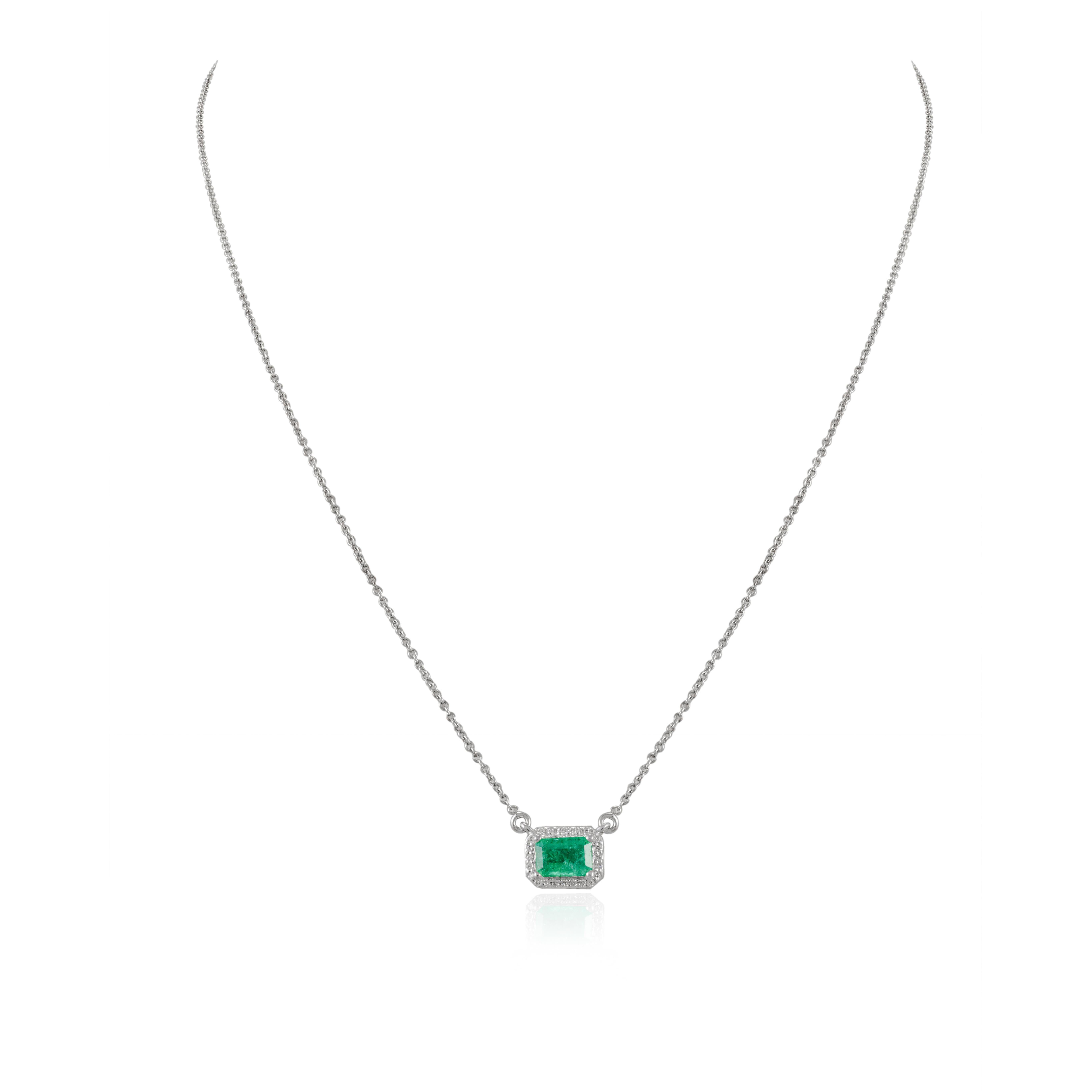 Natural Emerald Diamond Halo Chain Necklace with in 18K Gold studded with octagon cut emerald and round cut diamonds. This stunning piece of jewelry instantly elevates a casual look or dressy outfit. 
Emerald enhances intellectual capacity of the
