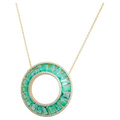 Natural emerald diamond pendant in 14k gold