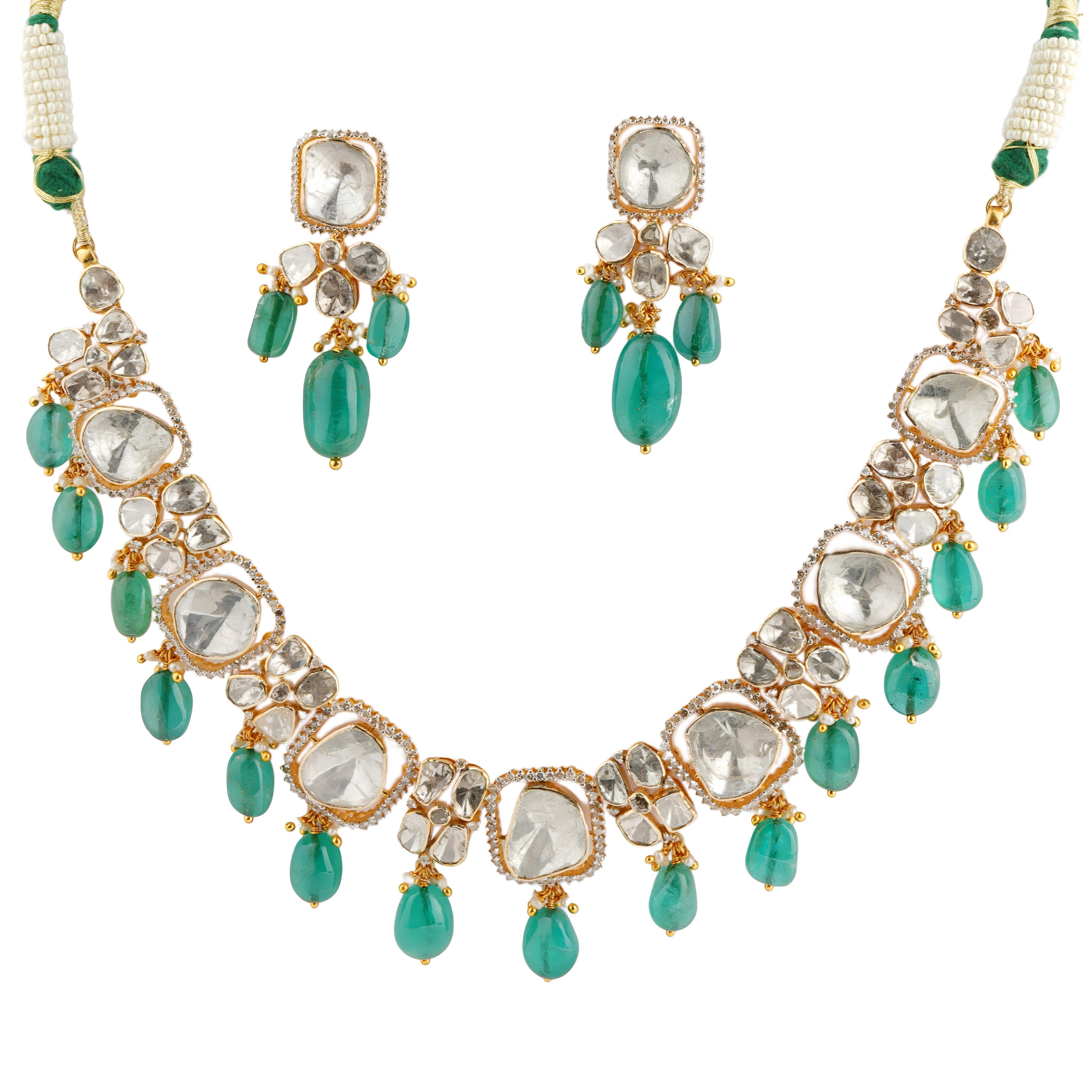 Gw=76.76gm
Nw=36.48gm
Diamond =4.55cts
Diamond polki=18.26cts
Emerald =99.66cts
Pearl =3.56cts

FOLLOW US ON INSTA( divinejewellerlounge)