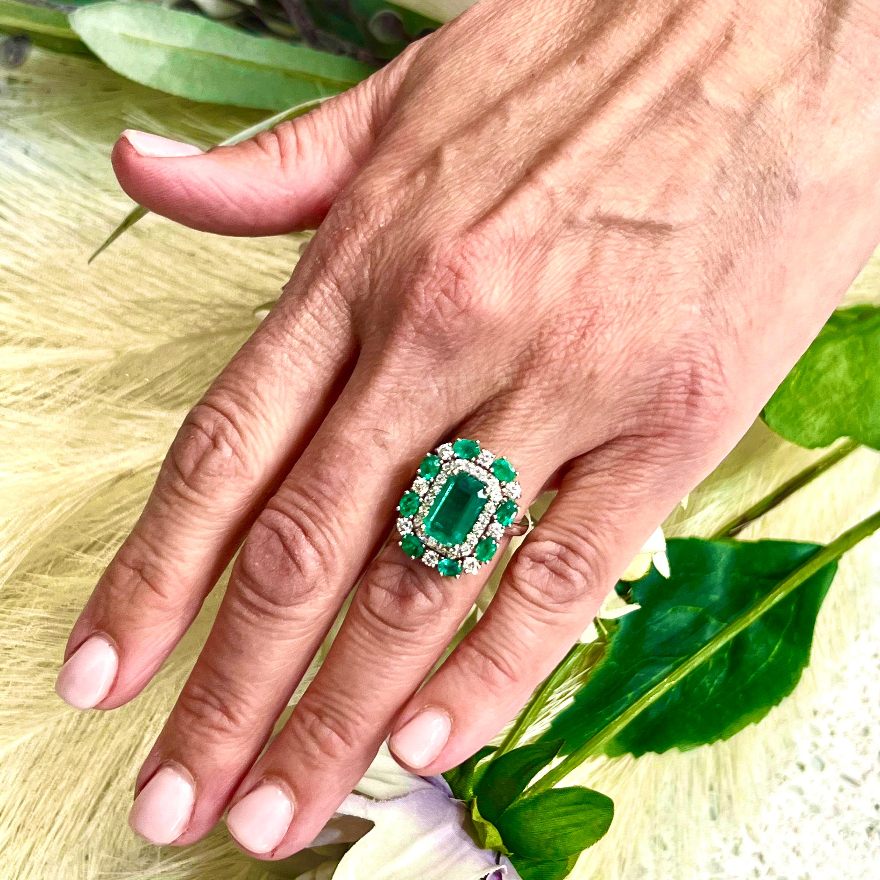 This One-of-a-Kind, Custom-Made Natural Emerald and Diamond Ring is a luxurious piece designed to captivate.

Crafted in 14k gold, it showcases a finely faceted, high-quality natural emerald as the center stone, radiating deep green elegance and