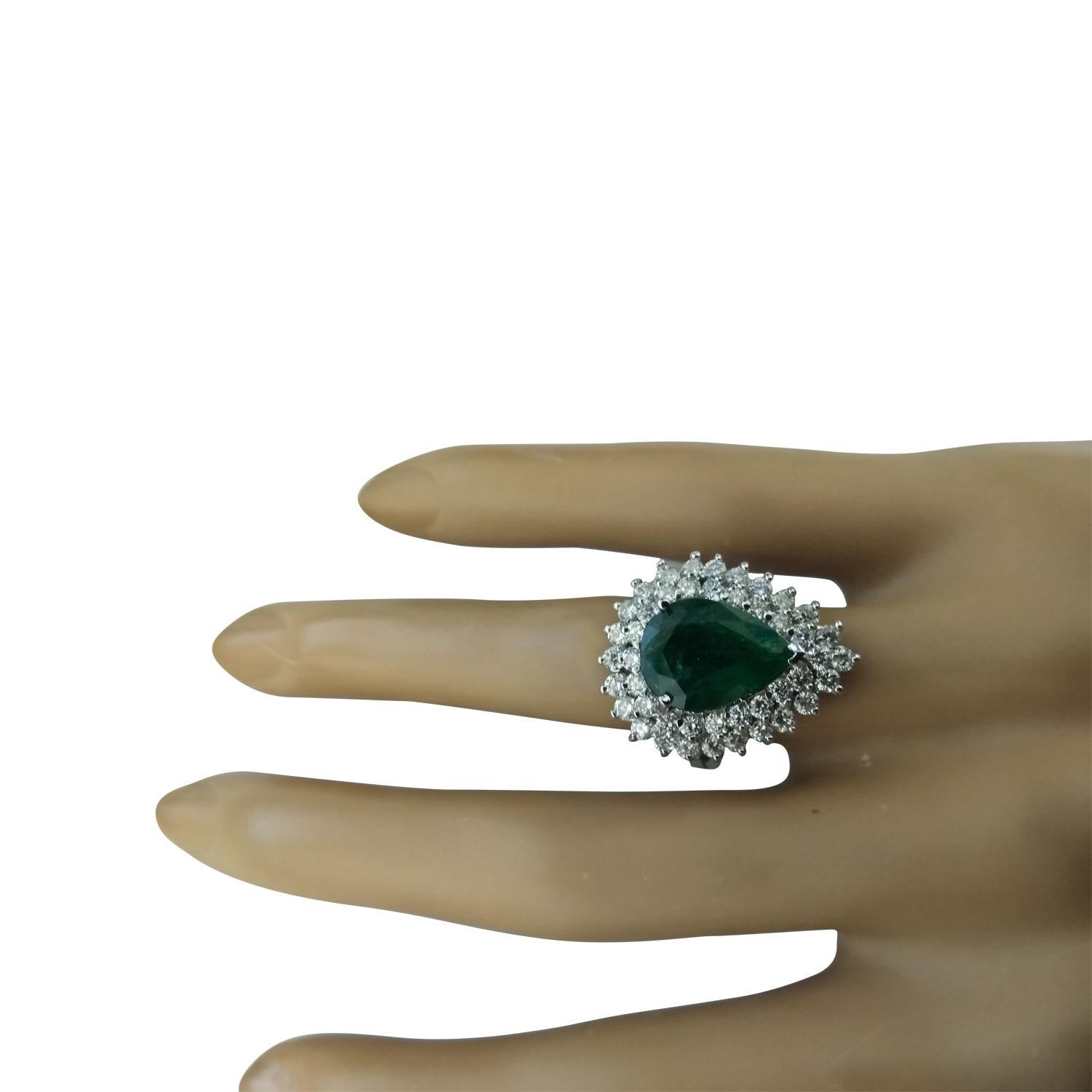 5.80 Carat Natural Emerald 14 Karat Solid White Gold Diamond Ring
Stamped: 14K 
Total Ring Weight: 6.3 Grams 
Emerald Weight 4.30 Carat (13.00x9.00 Millimeters)
Diamond Weight: 1.50 carat (F-G Color, VS2-SI1 Clarity )
Quantity: 34
Face Measures: