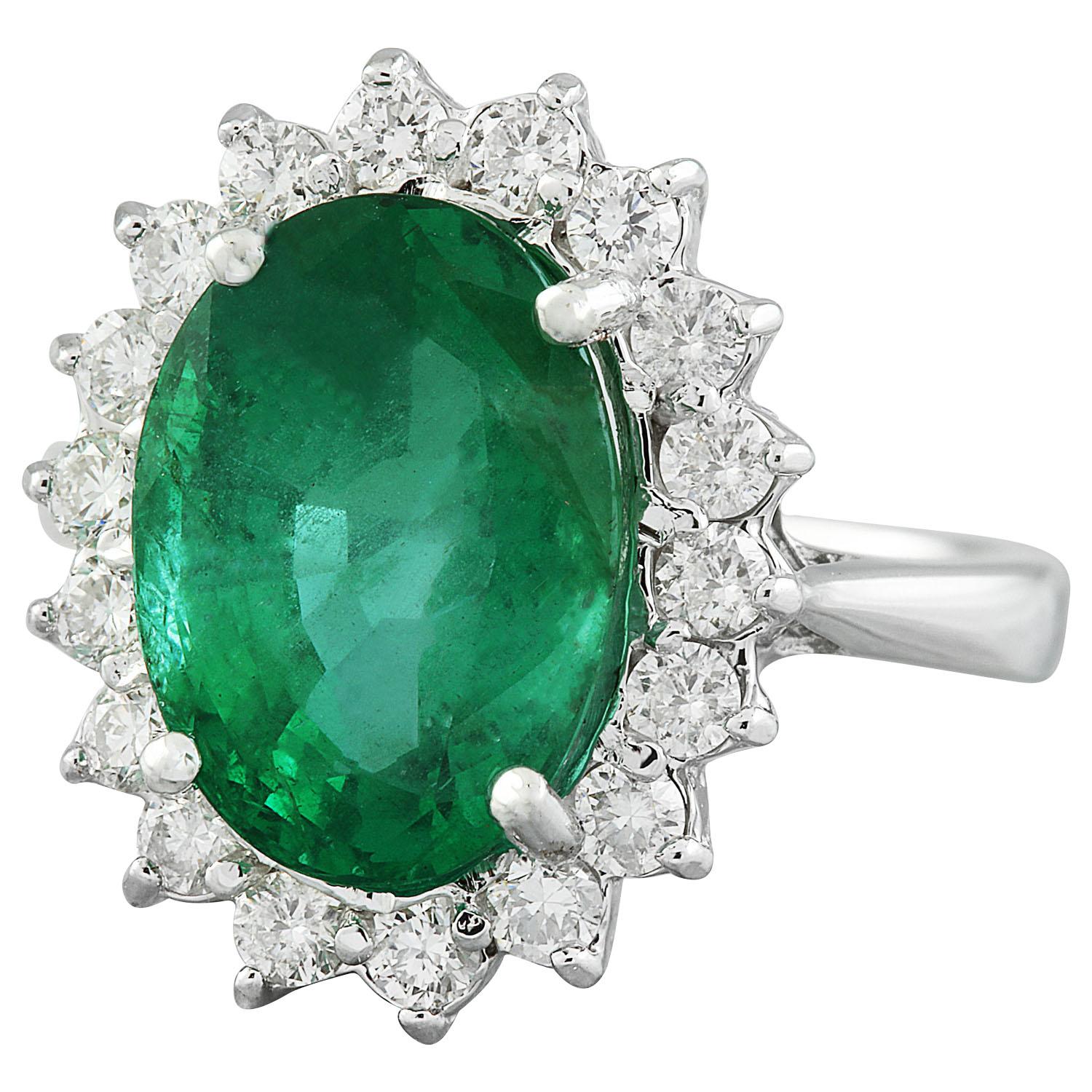 6.55 Carat Natural Emerald 14 Karat Solid White Gold Diamond Ring
Stamped: 14K 
Total Ring Weight: 5.3 Grams
Emerald Weight 5.55 Carat (12.00x10.00 Millimeters)
Diamond Weight: 1.00 carat (F-G Color, VS2-SI1 Clarity )
Face Measures: 18.30x14.95