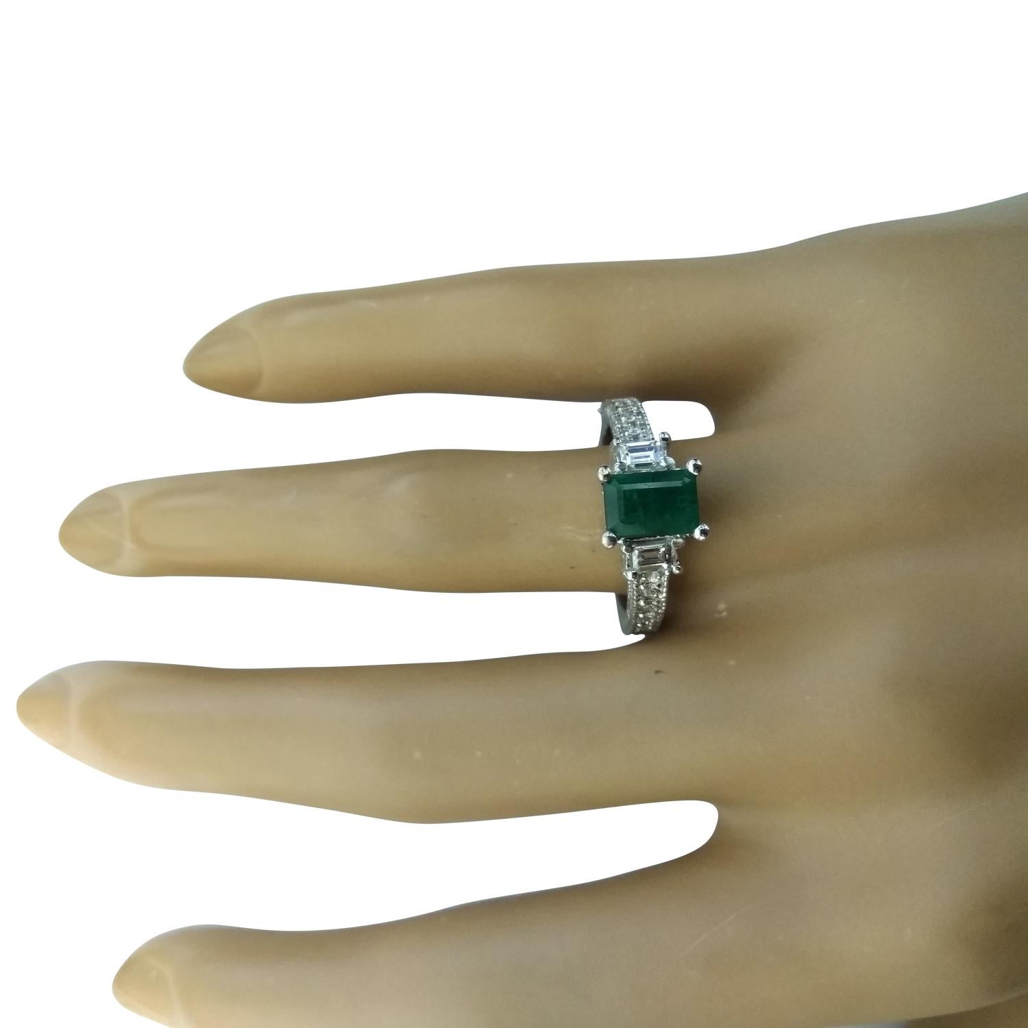 1.50 Carat Natural Emerald 14 Karat Solid White Gold Diamond Ring
Stamped: 14K
Total Ring Weight: 6 Grams 
Emerald Weight 1.20 Carat (7.00x5.00 Millimeters)
Diamond Weight: 0.30 carat (F-G Color, VS2-SI1 Clarity )
Face Measures: 7.00 Millimeter