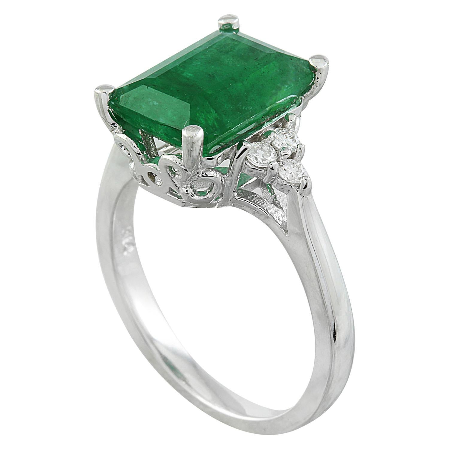 3.55 Carat Natural Emerald 14 Karat Solid White Gold Diamond Ring
Stamped: 14K 
Total Ring Weight: 4 Grams 
Emerald Weight 3.40 Carat (11.00x9.00 Millimeters)
Treatment: Oiling
Diamond Weight: 0.15 carat (F-G Color, VS2-SI1 Clarity )
Treatment: