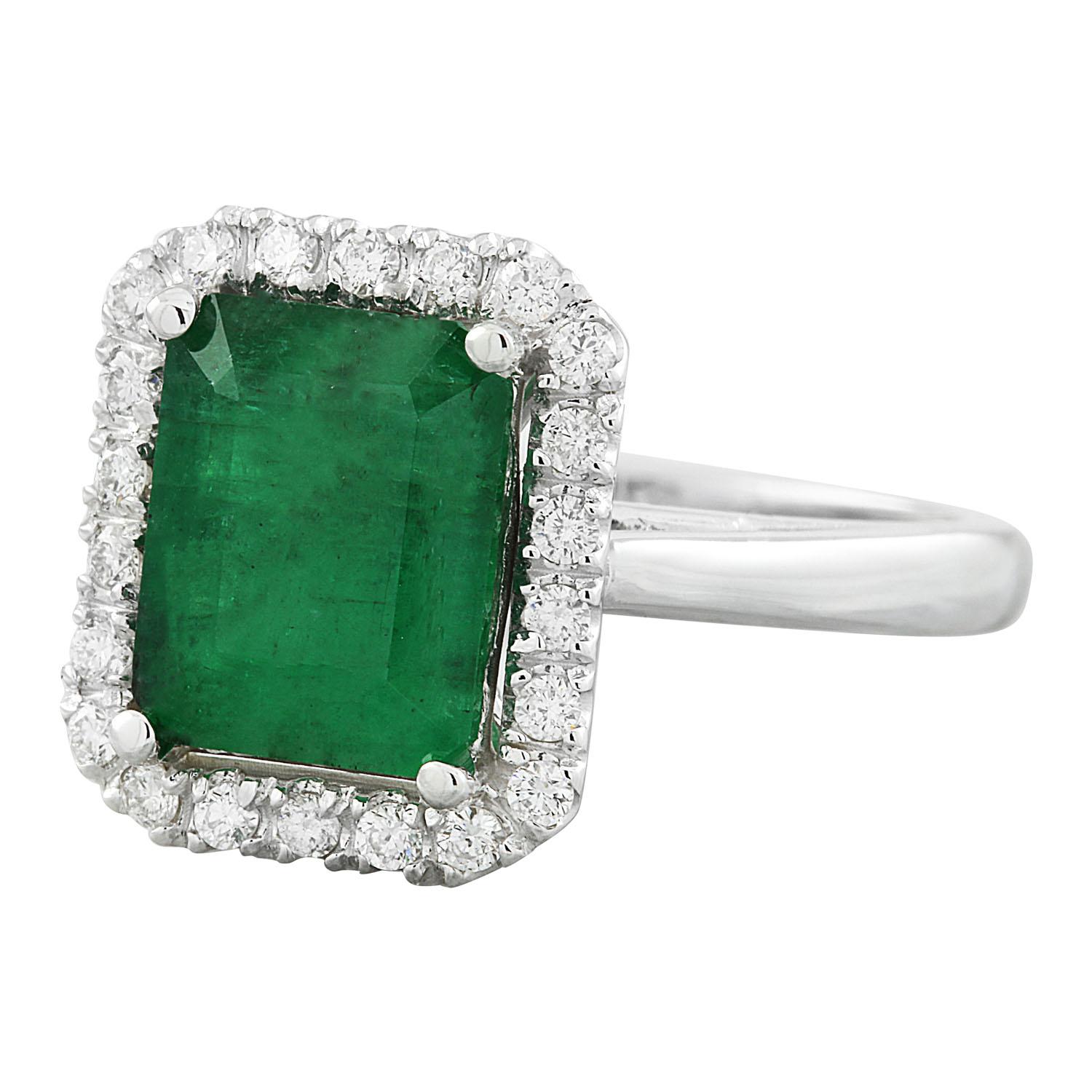 3.55 Carat Natural Emerald 14 Karat Solid White Gold Diamond Ring
Stamped: 14K 
Ring Size 7
Total Ring Weight: 5.2 Grams 
Emerald Weight 3.10 Carat (10.00x8.00 Millimeters)
Natural Emerald Treatment: Oil Only
Diamond Weight: 0.45 Carat (F-G Color,