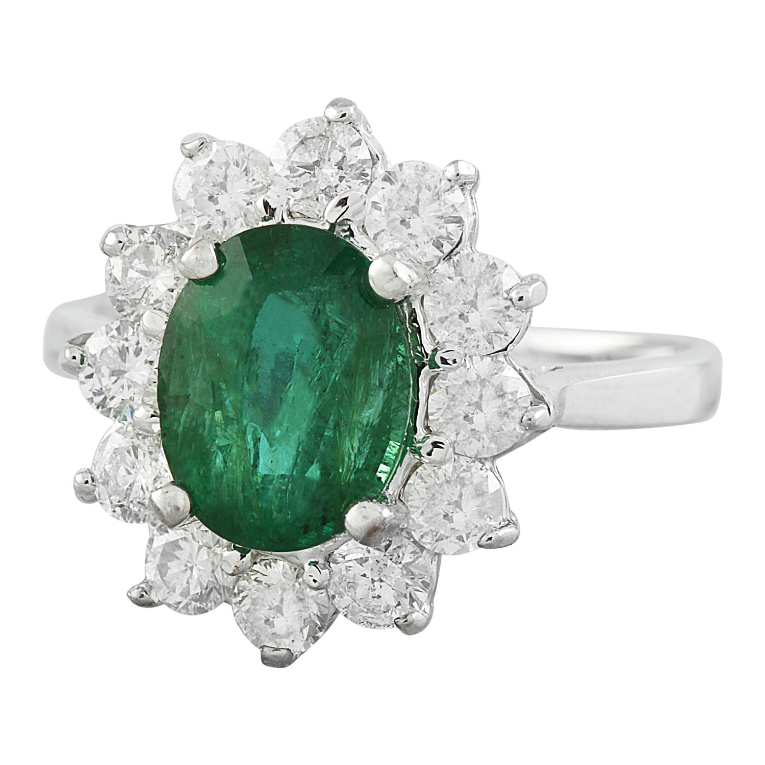 Introducing a captivating union of elegance and sophistication - the 3.23 Carat Natural Emerald 14 Karat Solid White Gold Diamond Ring. This ring is a testament to luxury and refinement.

Crafted to perfection, this ring, sized for a size 7 finger,