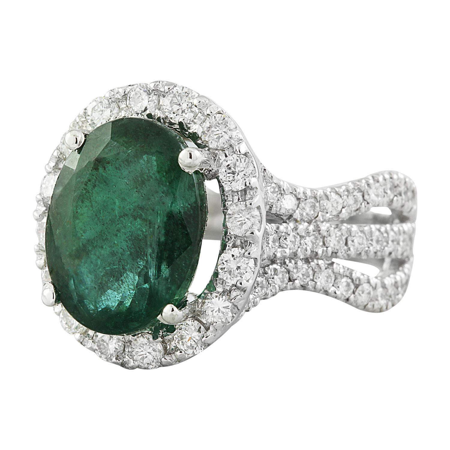 Introducing a masterpiece of unparalleled beauty and sophistication - the 6.86 Carat Natural Emerald 14 Karat Solid White Gold Diamond Ring. This ring is a true testament to luxury and elegance.

Crafted to perfection in 14K solid white gold, this