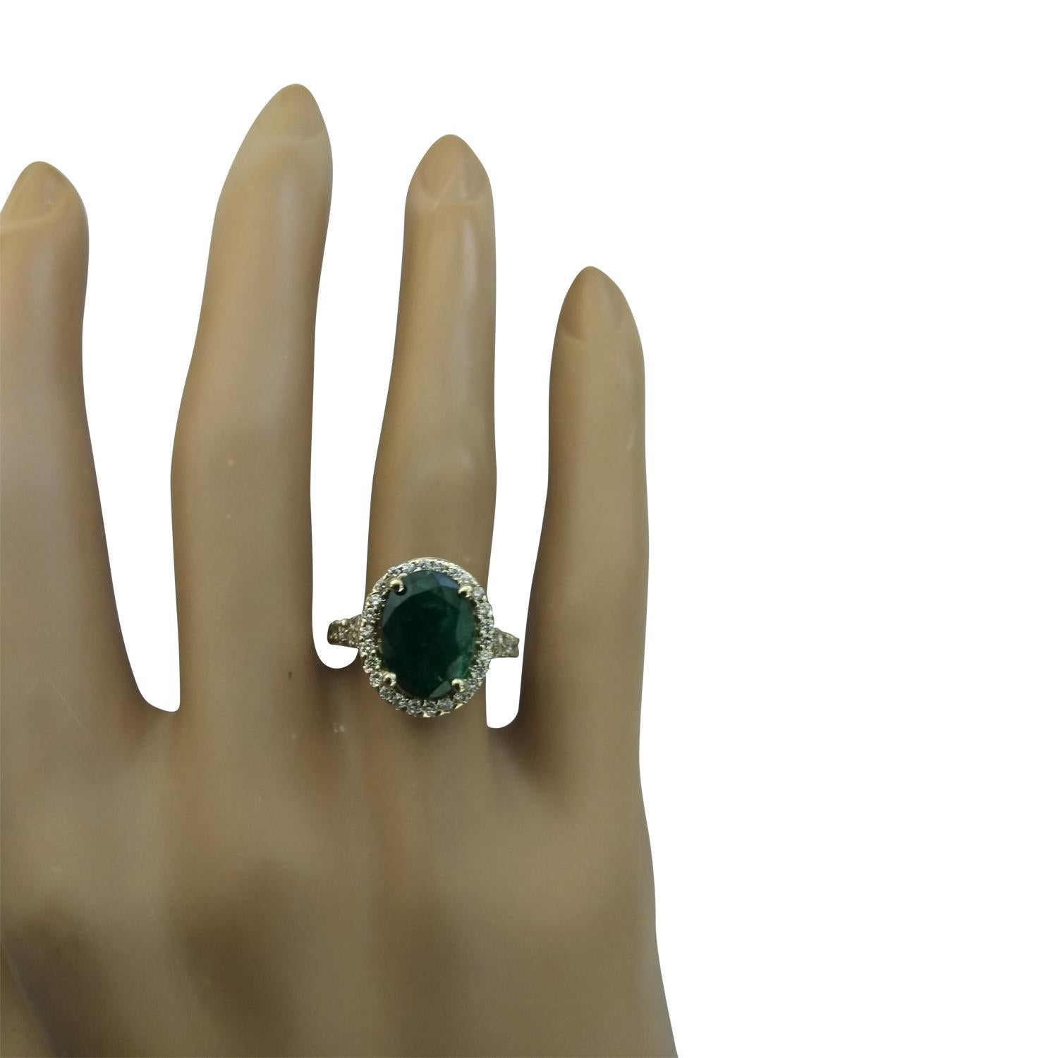 3.70 Carat Natural Emerald 14 Karat Solid Yellow Gold Diamond Ring
Stamped: 14K 
Total Ring Weight: 5.4 Grams
Emerald Weight 3.10 Carat (11.00x9.00 Millimeters)
Diamond Weight: 0.60 carat (F-G Color, VS2-SI1 Clarity )
Face Measures: 14.55x12.45