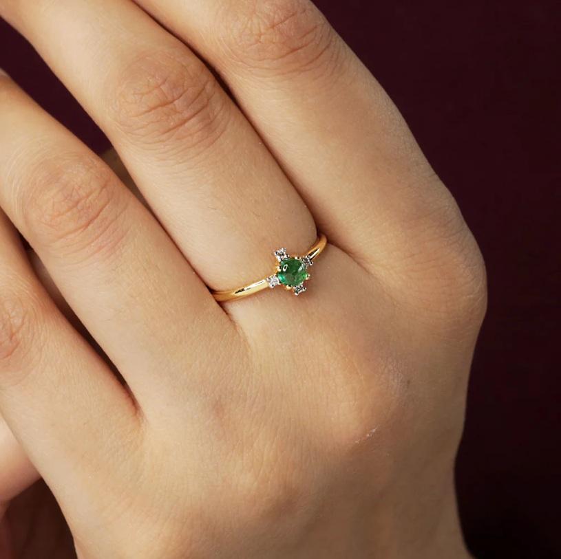The eye catching Emerald Ring is made with 14k yellow gold and beautiful emerald gemstone. It has a natural diamond to give rich look to your outfit.

Specifications:

Dimensions: Ring size-7.25 US, Top-8*2 MM
Gross Weight: 1.65 gms
Gold Weight: