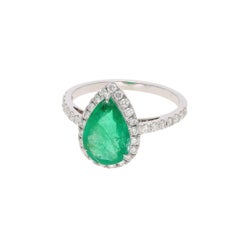 Bague « halo » en émeraude et diamants, en or 18 carats, Inde