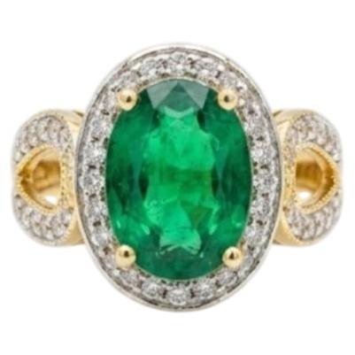 Eleganter Ring mit einem 1,50-Karat-Diamanten und einem 3,00-Karat-Smaragd aus 18-karätigem Gelbgold