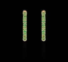 Natural emerald earring in 18k gold