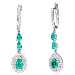 Pendiente Esmeralda natural con diamante 0,73 cts en oro de 18k