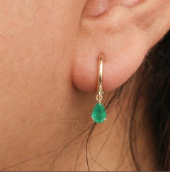 0,60 cts Pendientes de esmeralda natural en oro de 18k