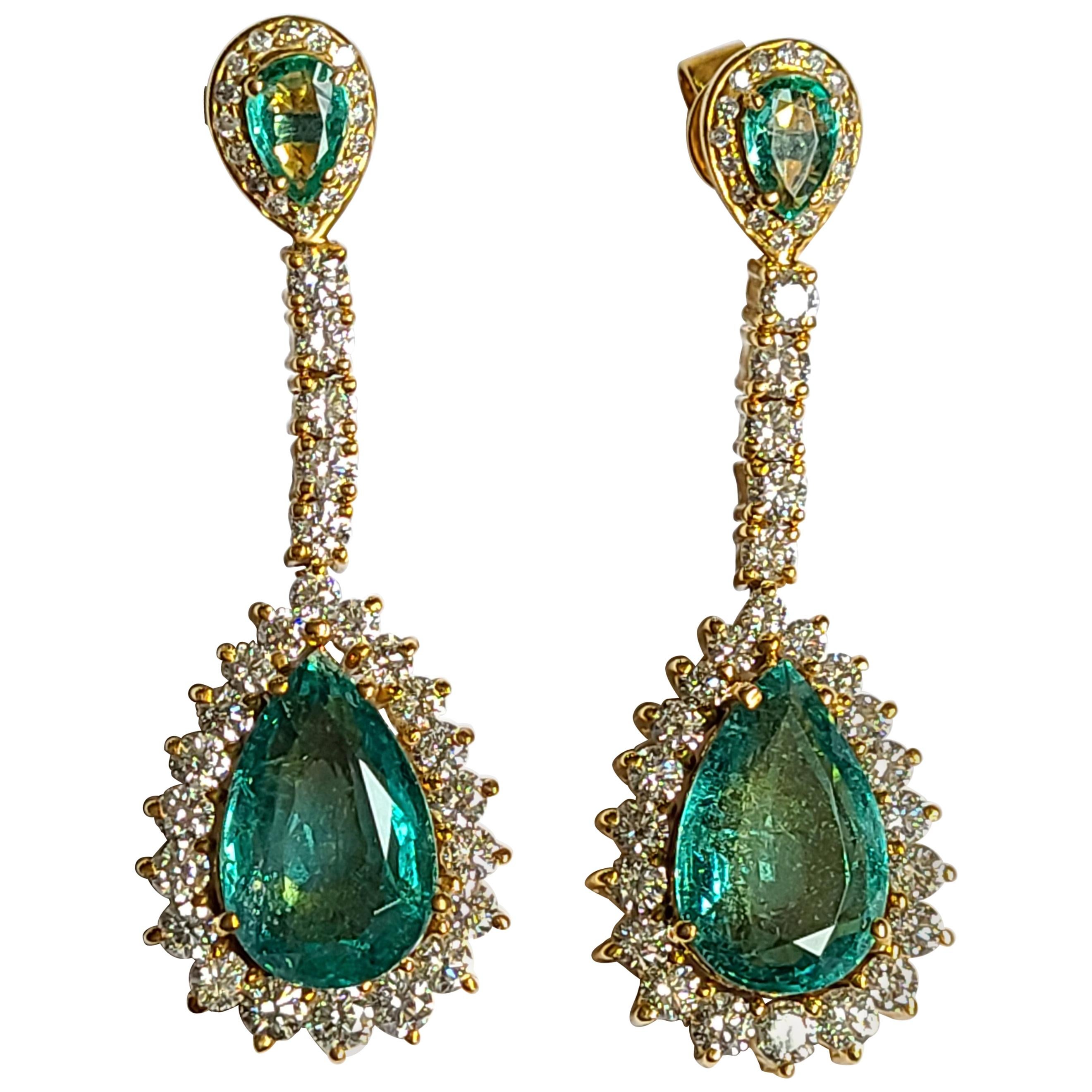Natural Emerald Earrings Set in 18 Karat Gold with Diamonds