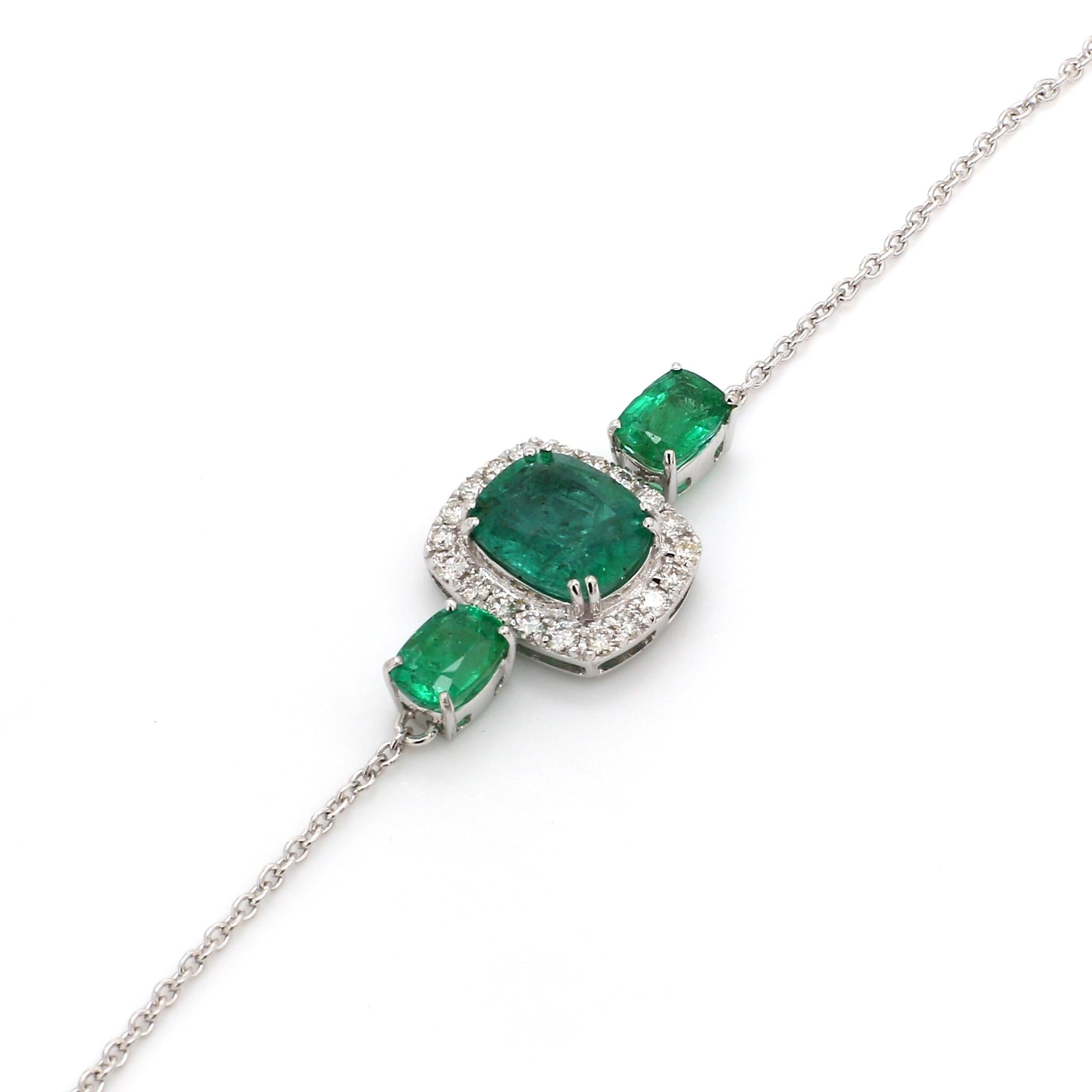 Crafted with precision and attention to detail, the bracelet is fashioned in luxurious 18 Karat White Gold, adding a timeless elegance to the design. The white gold setting provides the perfect backdrop for the emerald and diamonds, creating a