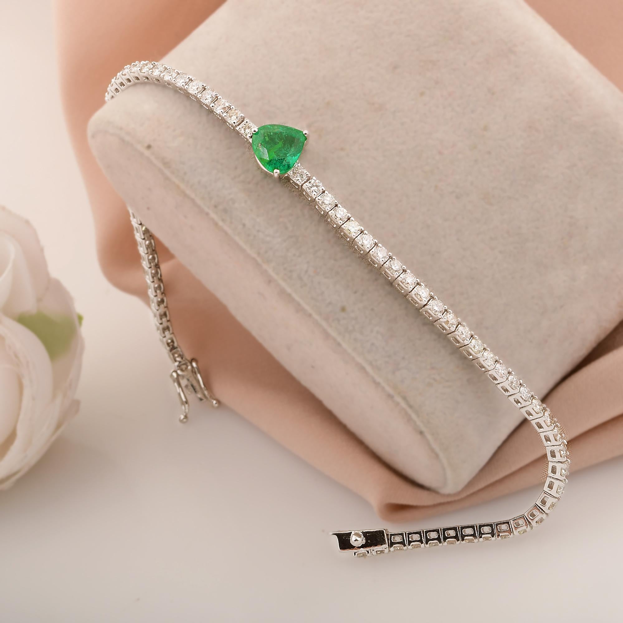 Item Code :- SFBR-4084B 
Gross Wt :- 7.19 gm
14k White Gold Wt :- 6.45 gm
Natural Diamond Wt :- 2.53 Ct.  ( AVERAGE DIAMOND CLARITY SI1-SI2 & COLOR H-I )
Zambian Emerald Wt :- 1.16 Ct.
Bracelet Size :- 7 Inch

✦ Sizing
.....................
We can