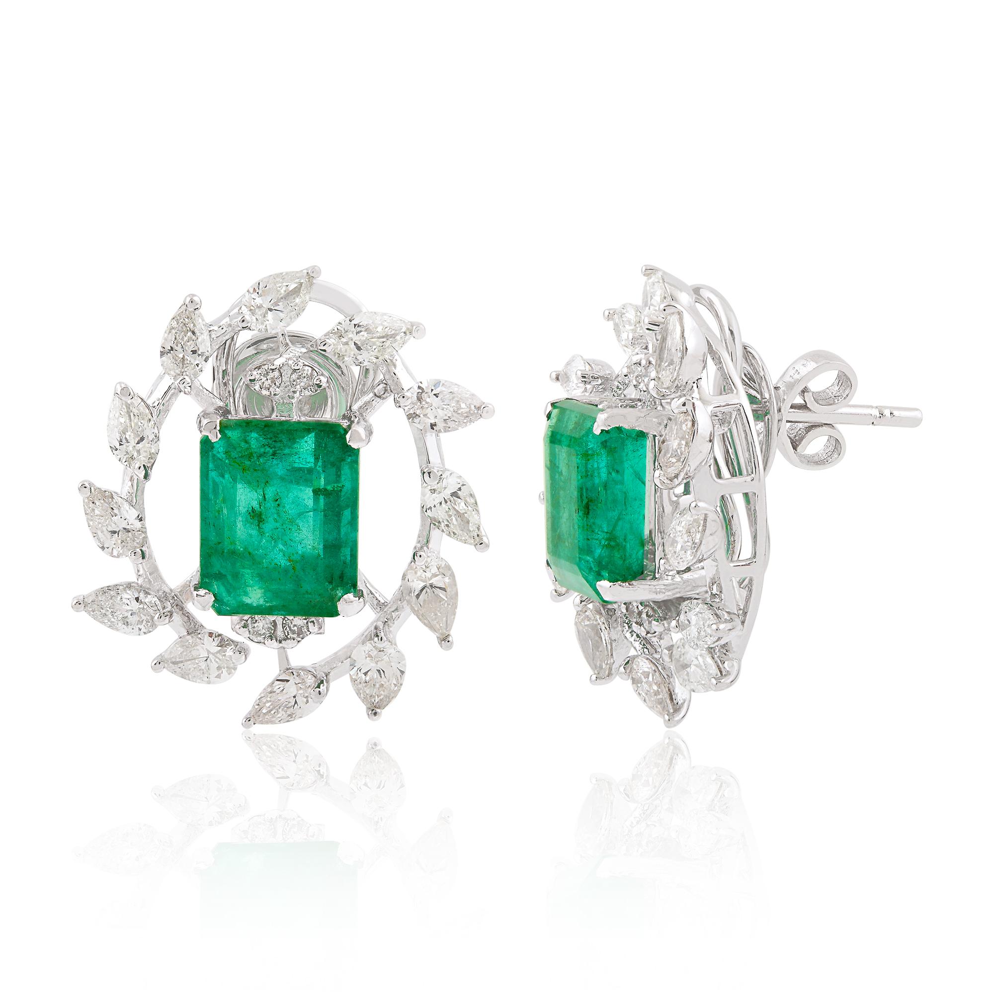 The pear-shaped diamonds, with their distinctive teardrop-like shape, complement the emerald and add additional sparkle and brilliance to the earrings. The diamonds are carefully selected for their quality, including considerations of cut, color,