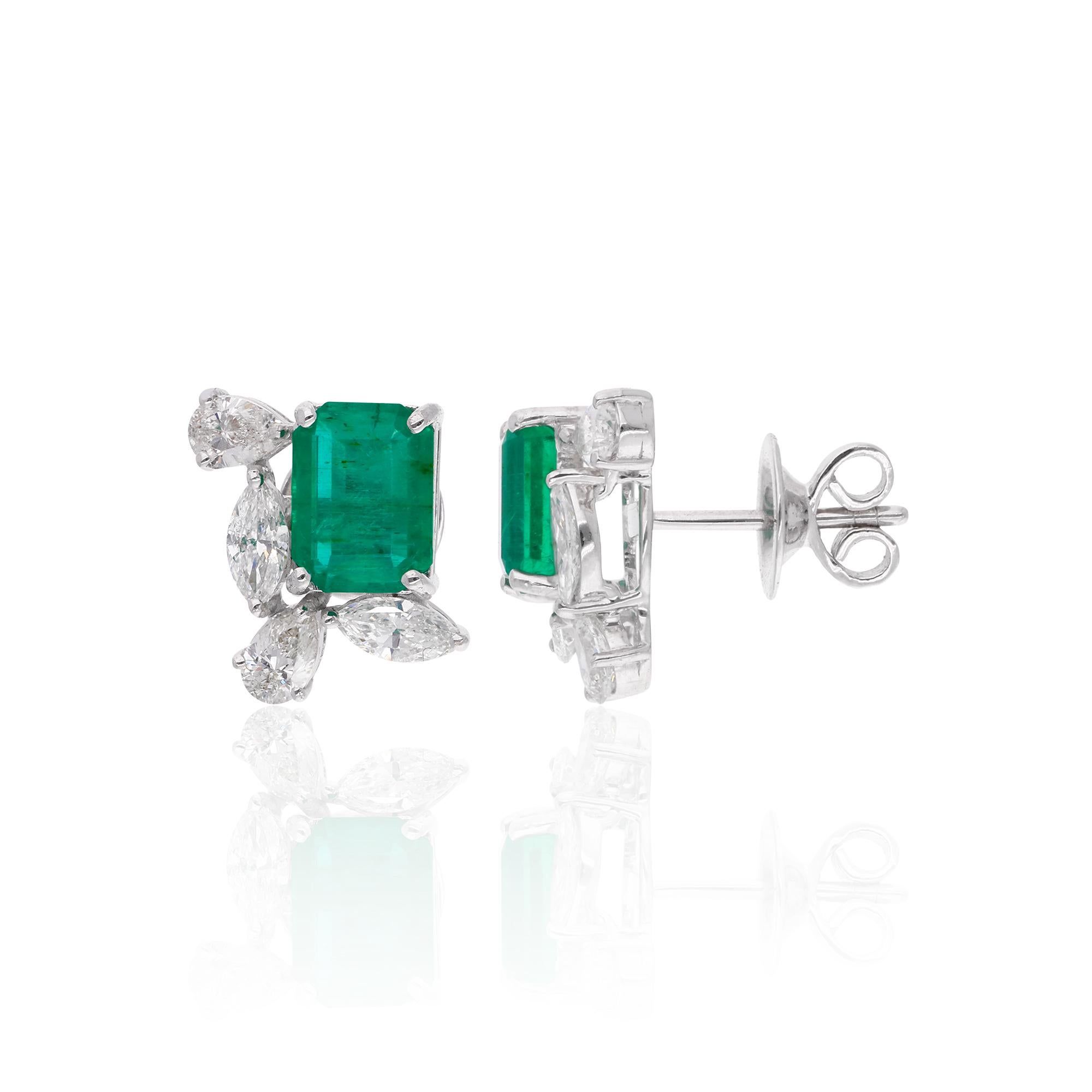 Cast from 14-karat gold, these exquisite earrings are handset with 2.61 carats Zambian emerald and 1.22 carats of sparkling diamonds.

FOLLOW SPECTRUM JEWELS storefront to view the latest collection & exclusive pieces. Spectrum Jewels is proudly