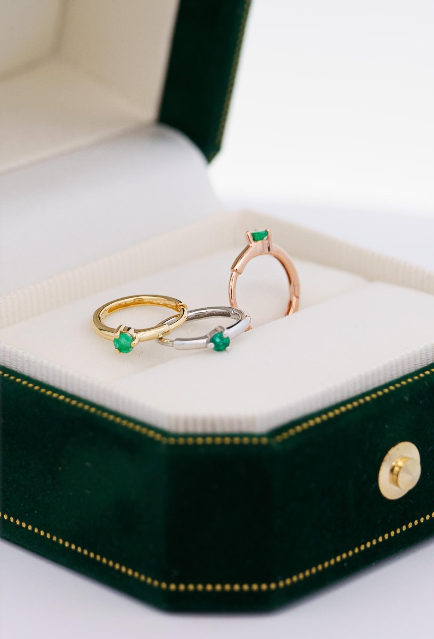 Simple and elegant natural emerald huggie earrings set in 14k solid white gold for long-lasting and durable use. Hypoallergenic, sleep-safe, waterproof, and fixed with a secure lock clip that was made to be worn daily. Ideal for earlobe, cartilage,