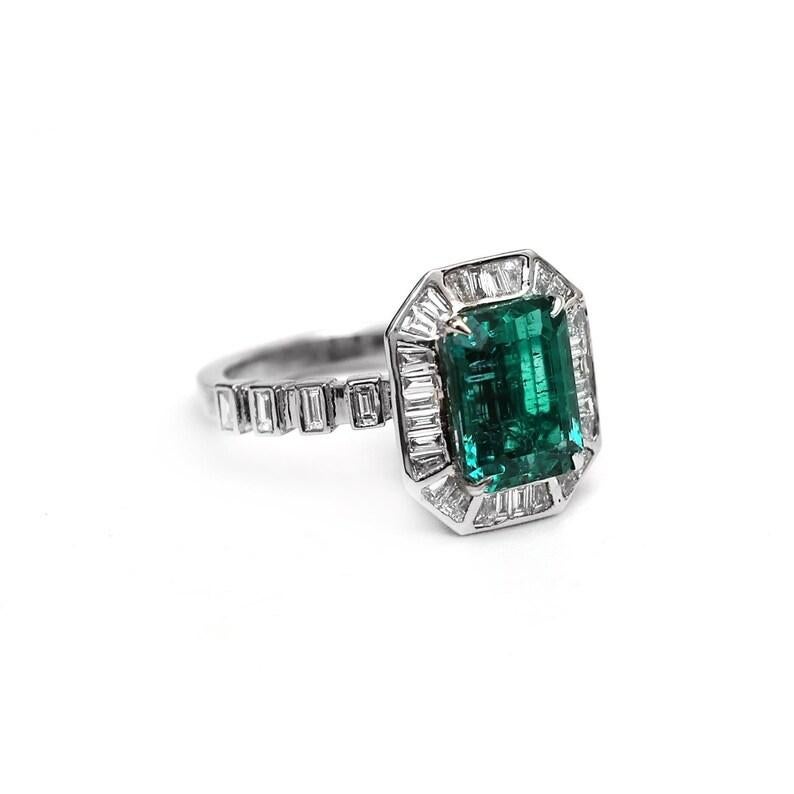 Contemporary Natural Emerald octagon channel set diamond ring gold in 18k