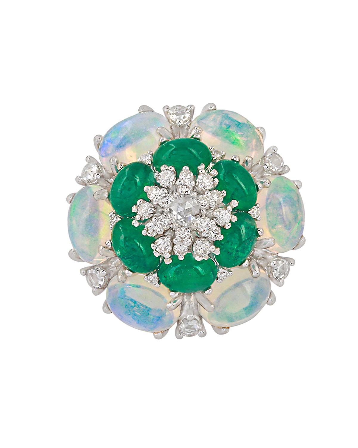 This ring is made with an emerald opal gemstone and diamond pave setting. The ring is made with 18K gold and is a size 7.

Specifications

Dimensions: Width: 2 cm
Gross Weight: 11.410 gms
Gold Weight: 9.618 gms
Gold Purity: 18K White Gold
Diamond