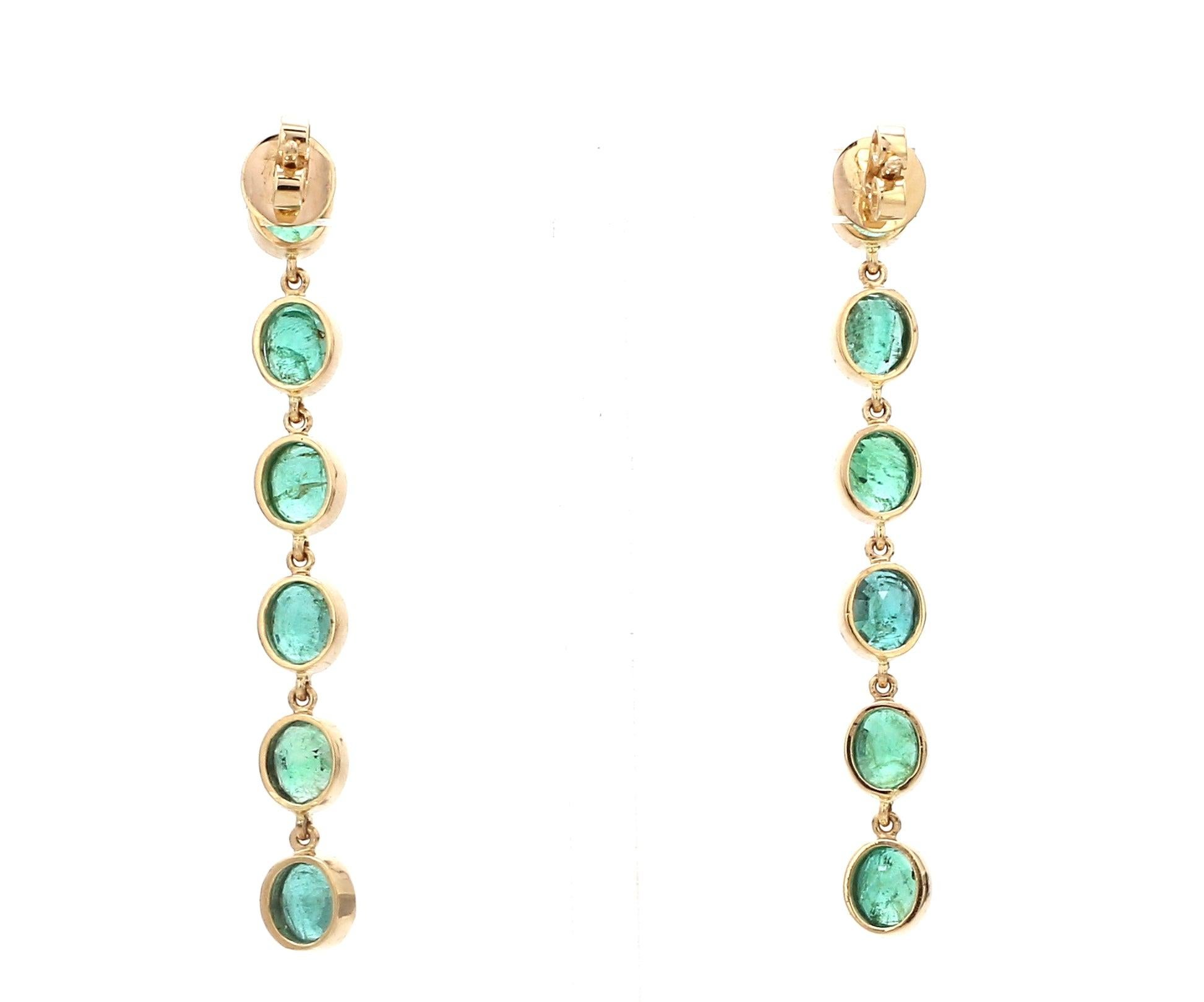 Gemstone : Emerald

Type : Natural

Shape : Oval Cut

Size : 6x5MM

Weight : 6 Carats

Earring Length : 40MM 

Metal : Gold

Enhancement : Oiling

This is a Brand new Piece

. Its very hard to capture the true color and luster of the stone, I have