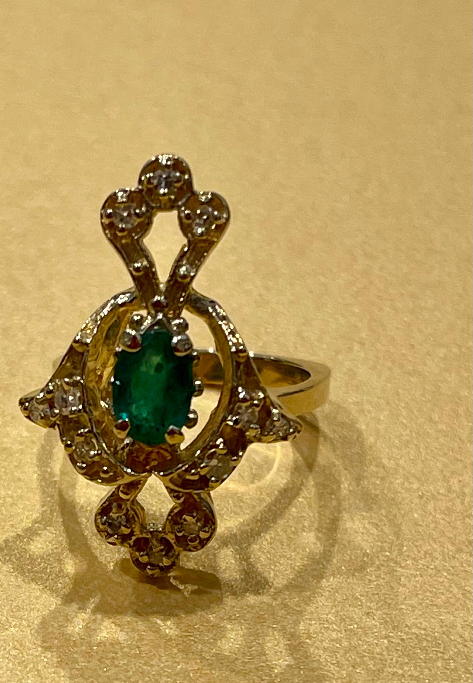 Natural Emerald, Oval Stone and Diamond Ring 14 Karat Yellow Gold For Sale 9