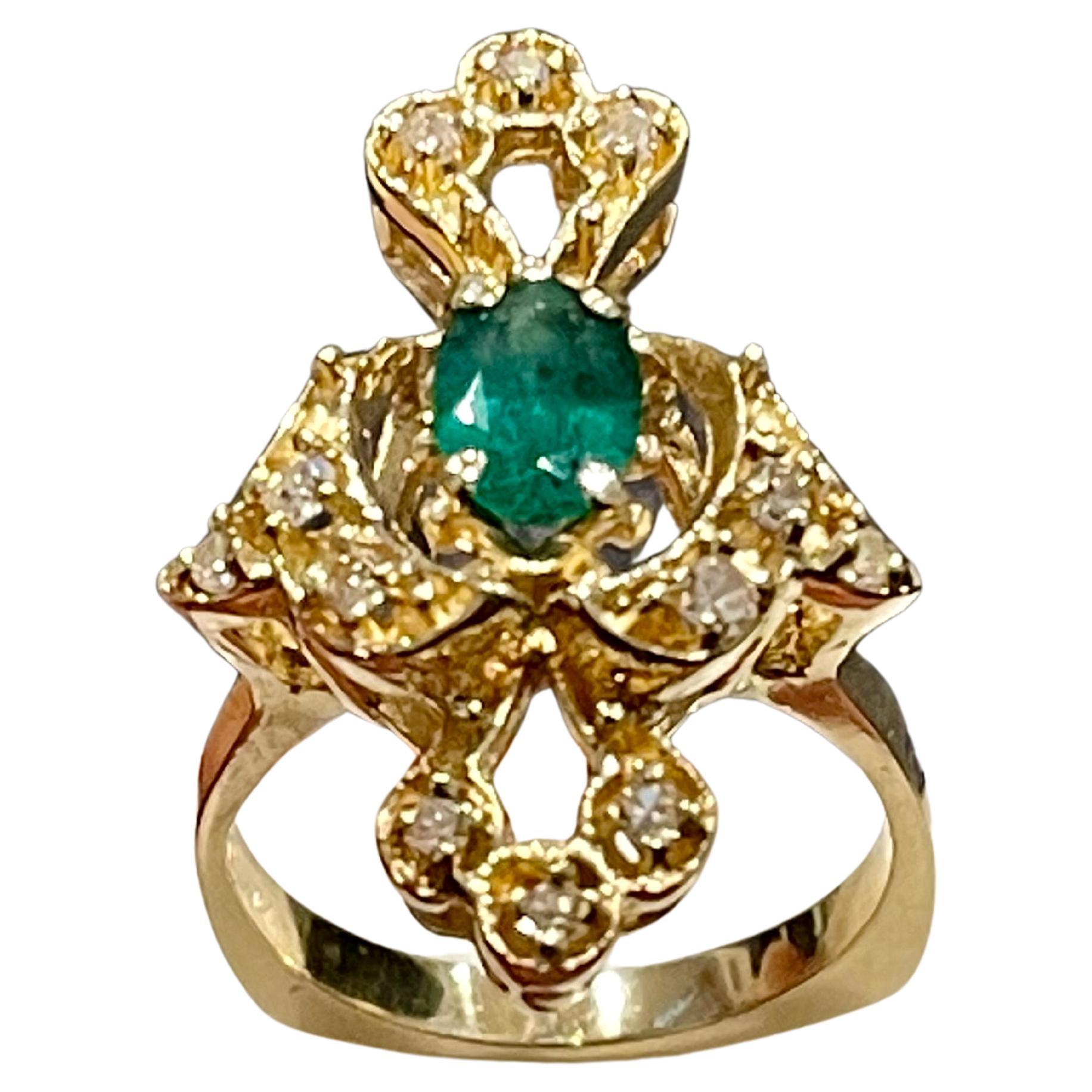 Natural Emerald, Oval Stone and Diamond Ring 14 Karat Yellow Gold In Excellent Condition For Sale In New York, NY
