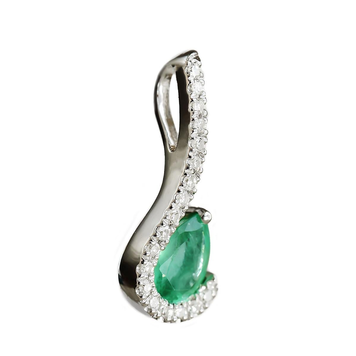 A beautifully crafted petite 9 carat solid white gold pendant set with a 0.30 carat pear cut emerald and 18 shimmering diamonds.

The natural earth mined emerald is an eye pleasing luscious green in colour with some tiny inclusions typical of