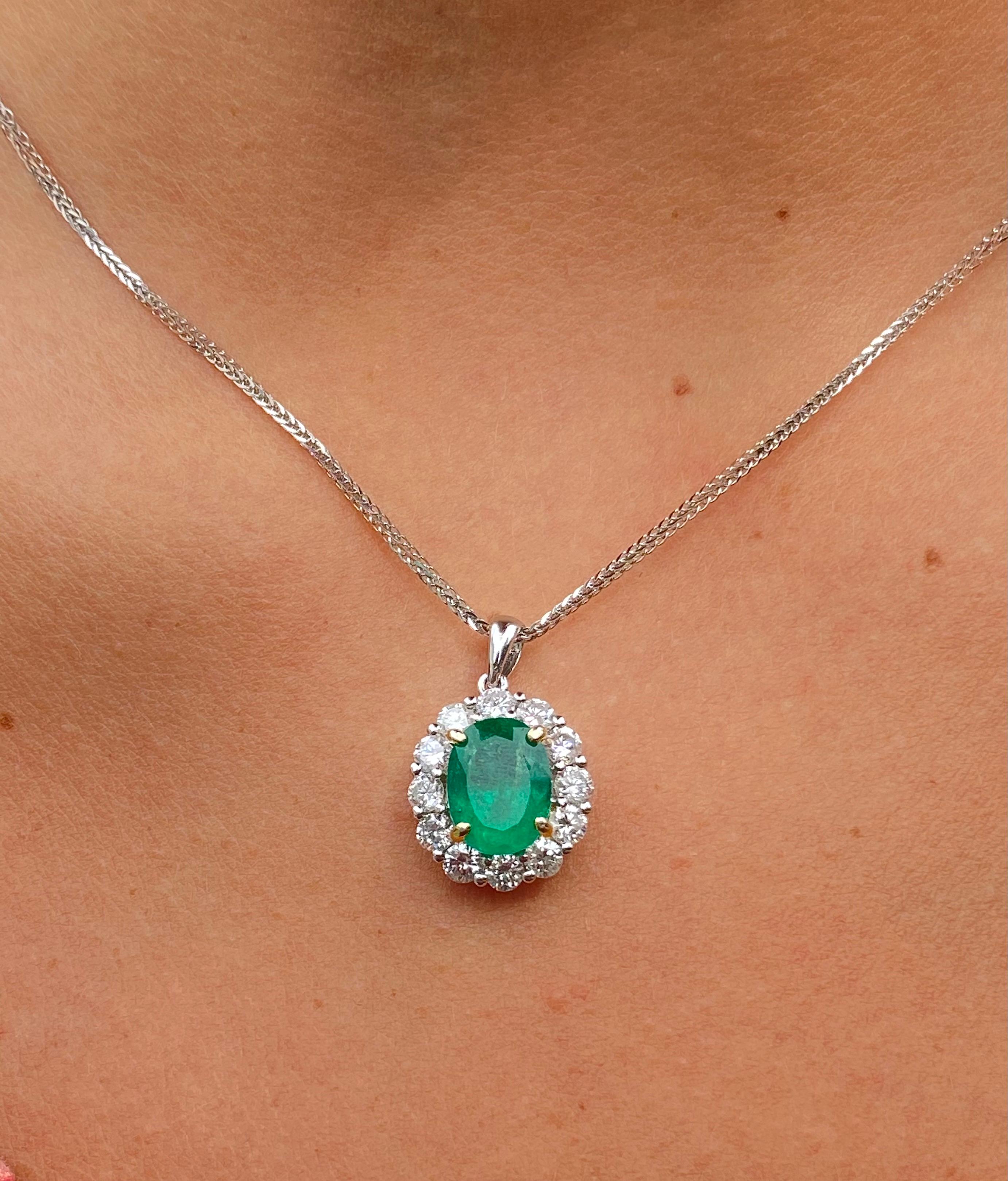 Oval Cut Natural Emerald Pendant and Diamond Halo in 18k Solid White Gold For Sale