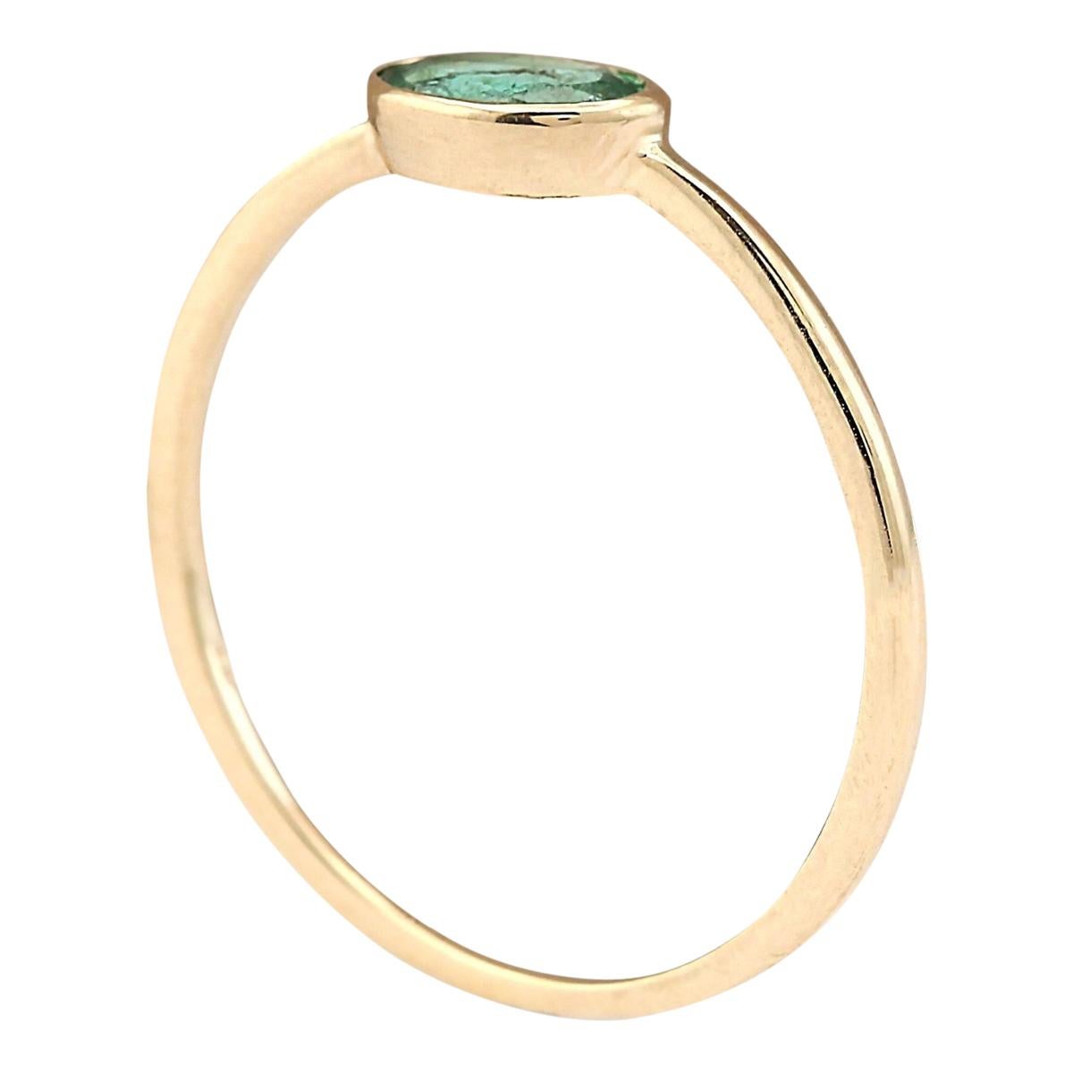 Modern Natural Emerald Ring In 14 Karat Yellow Gold For Sale