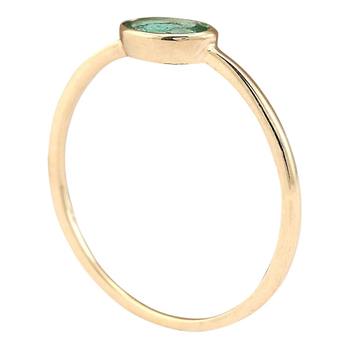 Modern Natural Emerald Ring In 14 Karat Yellow Gold  For Sale