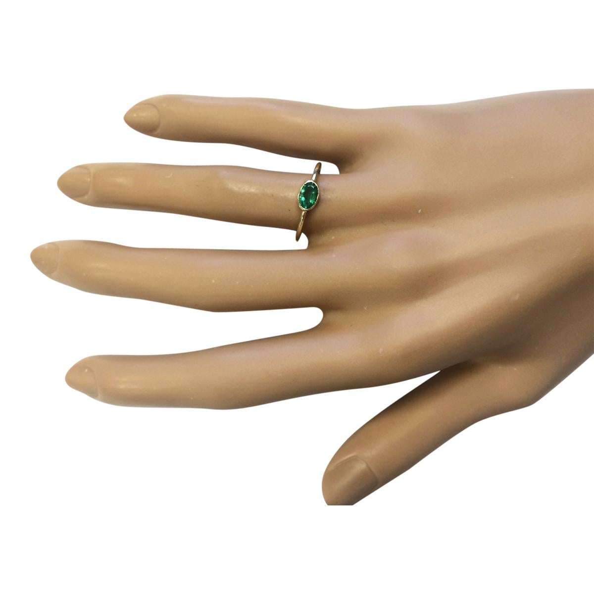 Oval Cut Natural Emerald Ring In 14 Karat Yellow Gold  For Sale