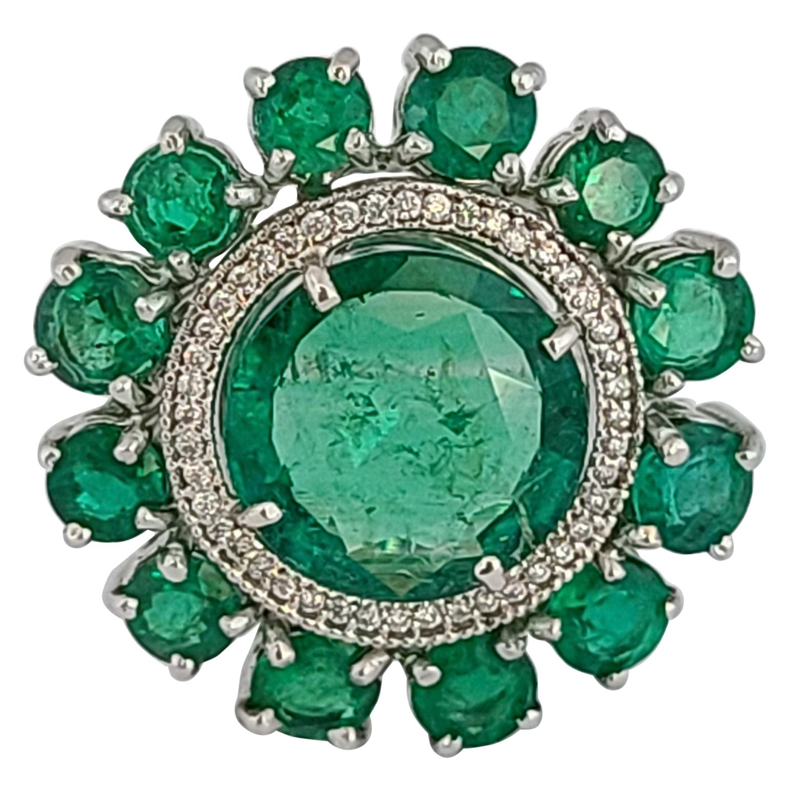 Natural Emerald Ring Set in 18 Karat Gold with Diamonds at 1stDibs