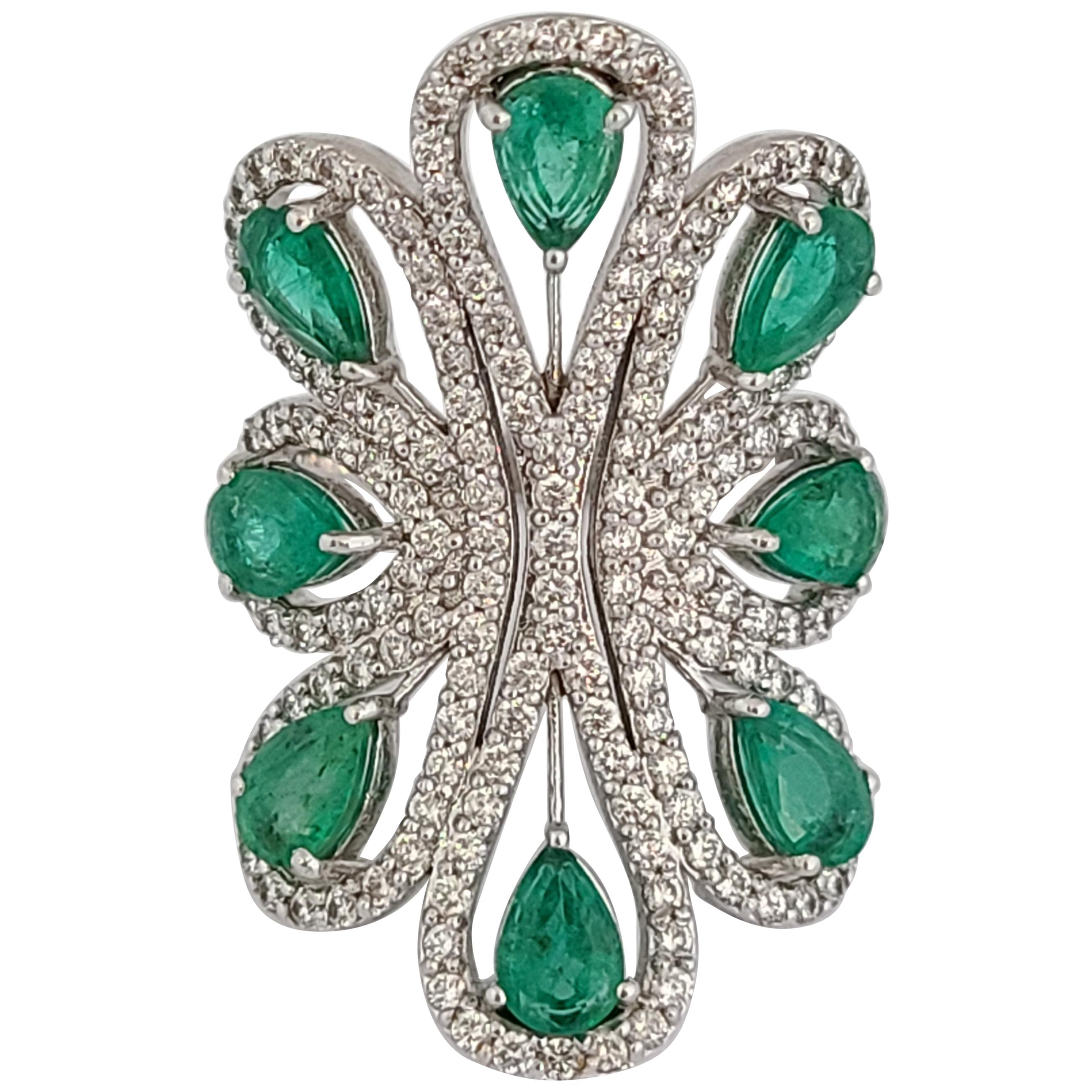 Natural Emerald Ring Set in 18 Karat Gold with Diamonds