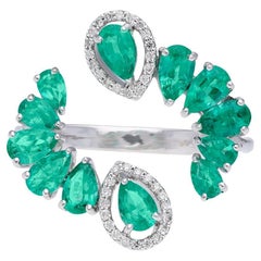 Natural Emerald Ring with diamond 0.14 cts in 18k gold
