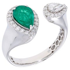 Natural Emerald ring with diamond 0.58 cts in 18k gold