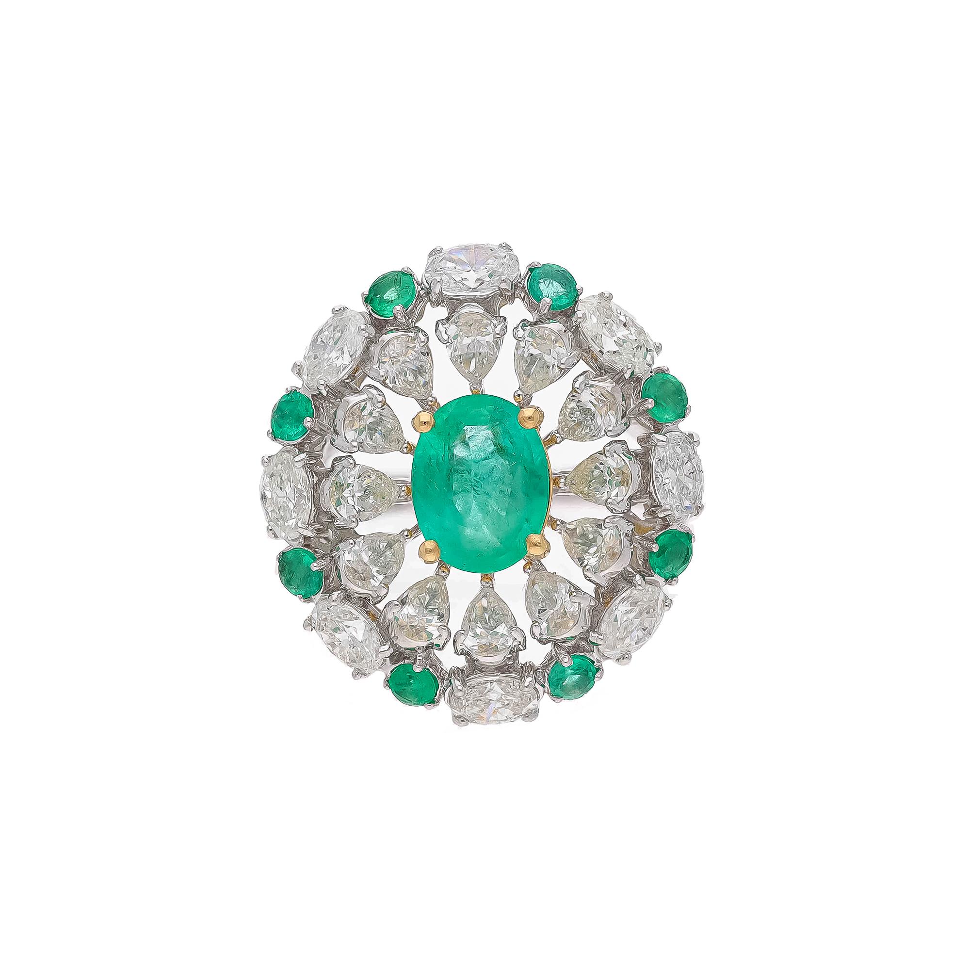 Diamonds : 3.59 carats
Emerald : 1.97carats
Gold : 8.53 gm( 18k)

This is a beautiful natural Columbian ring  with very high quality emeralds and diamonds ( vsi and G colour

Its very hard to capture the true color and luster of the stone, I have