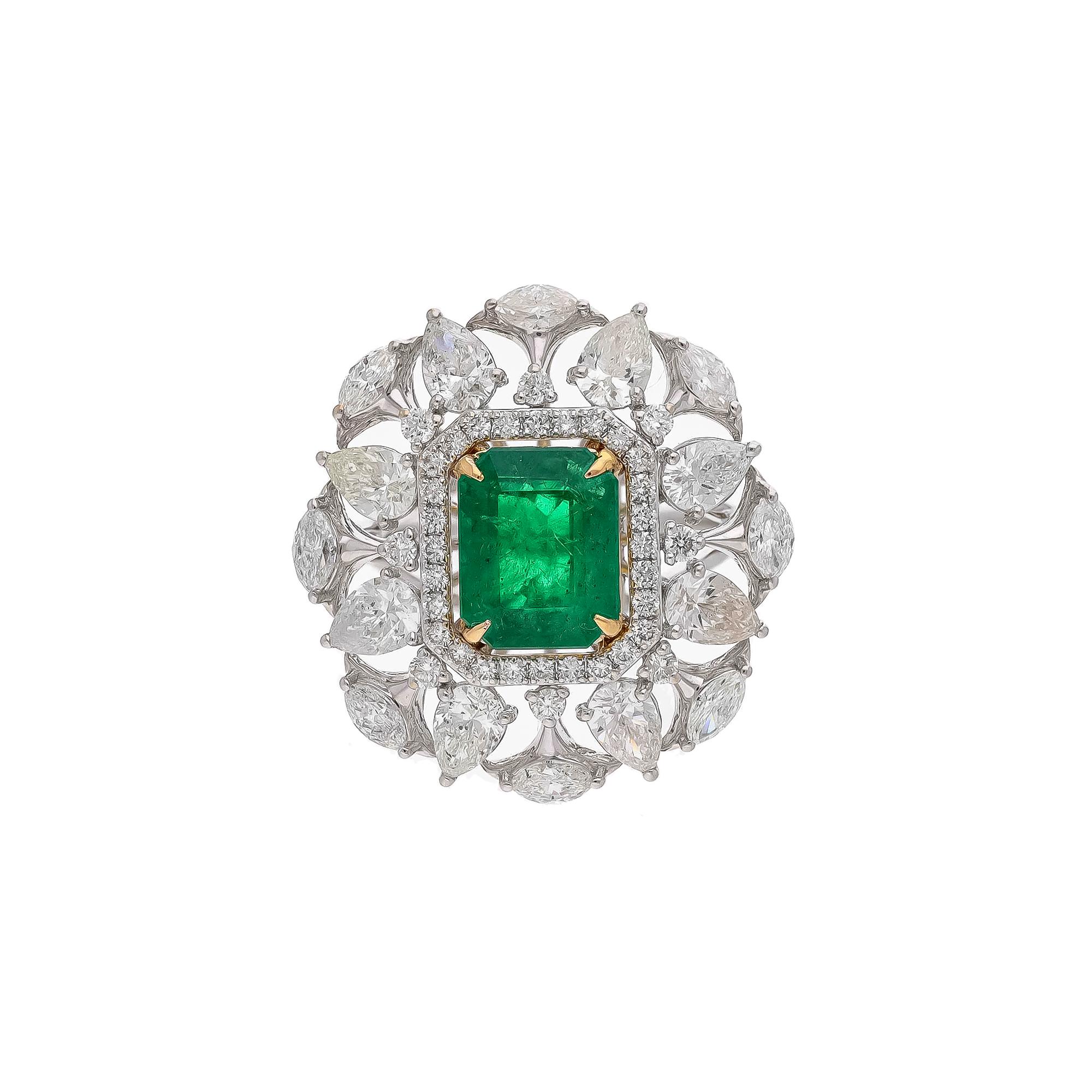 Diamonds : 2.58 carats
Emerald : 2.74carats
Gold : 5.75 gm( 18k)

This is a beautiful natural Columbian ring  with very high quality emeralds and diamonds ( vsi and G colour

Its very hard to capture the true color and luster of the stone, I have